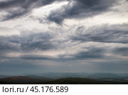 Южный Урал: грозовое небо в закатном свете. Southern Urals: stormy sky in the sunset light. Стоковое фото, фотограф Евгений Романов / Фотобанк Лори