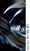Arrangement of smooth gray lines gracefully intertwines against a soft abstract bokeh background, adding depth and allure. Composition invites the viewer to explore its fluid design. Generative AI. Стоковое AI-изображение, AI-художник Юлия Петровская / Фотобанк Лори