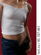 Sexy blonde in unbuttoned jeans and top view. Стоковое фото, фотограф Гурьянов Андрей / Фотобанк Лори