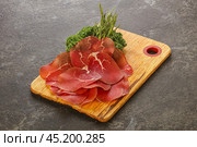 Italian cuisine - bresaola di Milano. Стоковое фото, фотограф Андрей Старостин / Фотобанк Лори
