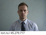 Serious man with pixels on his face so that he cannot be recognized. Стоковое AI-изображение, AI-художник Дмитрий Киселёв / Фотобанк Лори