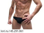Handsome muscular bodybuilder posing on white background. High key close up studio isolated shot . Стоковое фото, фотограф Станислав Тарко / Фотобанк Лори