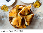 Sliced georgian bread served for lunch in restaurant. Стоковое фото, фотограф Яков Филимонов / Фотобанк Лори
