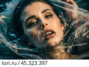 The girl is wrapped in cellophane or a bag. The girl is suffocating. Plastic pollution of the planet. Environmental hazard. Reducing the reuse of plastic. Recycling. The concept of garbage. Стоковое AI-изображение, AI-художник Photojuli / Фотобанк Лори