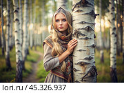 A beautiful girl in a traditional Russian folk shawl in a summer birch grove. The portrait symbolizes the traditions and beauty of the Russian people. Стоковое AI-изображение, AI-художник Photojuli / Фотобанк Лори