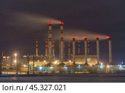 Трубы одной из Московских ТЭЦ морозным вечером (2019 год). Стоковое фото, фотограф YuryKara / Фотобанк Лори