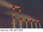 Трубы одной из Московских ТЭЦ морозным вечером (2019 год). Стоковое фото, фотограф YuryKara / Фотобанк Лори