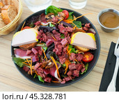 Portion of perigord salad on table. Стоковое фото, фотограф Яков Филимонов / Фотобанк Лори