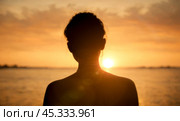Woman Outline on Setting Sun, Capturing Dusk Tranquility, Warm Hues of Evening Sky, Harmony of Nature Beauty, Serene Scenery of Summer Twilight. Стоковое фото, фотограф Павел Муравьев / Фотобанк Лори
