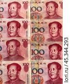 Close-up view of paper money Chinese yuan. Set of 100 yuan bills on table. Monetary financial background. Flat lay, close-up, top view. Стоковое фото, фотограф Виктория Катьянова / Фотобанк Лори