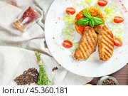 steaks with kuskus groats. Стоковое фото, фотограф Сергей Толмачёв / Фотобанк Лори
