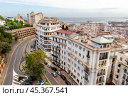 Aerial view of street, houses and rooftops in center of Algiers. View of seaport and Mediterranean Sea. Republic of Algeria. Стоковое фото, фотограф Евгений Ткачёв / Фотобанк Лори