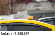 Moscow, Russia, November 08, 2024: taxi cars with checkers on the street of Moscow. Редакционное фото, фотограф Igor Skripachev / Фотобанк Лори