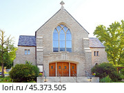 St. Bernard Catholic Church was built of Indiana limestone, of modified Gothic architecture, with roof of Vermont slate of variegated colors. Wabash, Indiana (2014 год). Редакционное фото, фотограф Валерия Попова / Фотобанк Лори