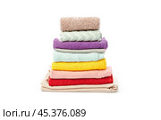 stack of clothing isolated on white. Стоковое фото, фотограф Сергей Толмачёв / Фотобанк Лори