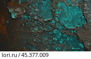 Turquoise paint peeling showing rust underneath. Стоковое видео, видеограф Данил Руденко / Фотобанк Лори