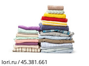 stack of clothing isolated on white. Стоковое фото, фотограф Сергей Толмачёв / Фотобанк Лори