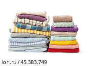 stack of clothing isolated on white. Стоковое фото, фотограф Сергей Толмачёв / Фотобанк Лори