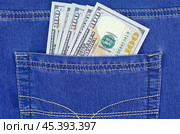 Доллары в кармане джинсов. Dollars bills in jeans pocket close-up. Стоковое фото, фотограф Татьяна Д / Фотобанк Лори