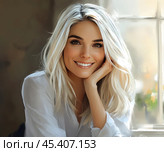 A blonde woman with a gentle smile looks in the mirror, her gaze is full of care and love for herself. Created by AI. Стоковое AI-изображение, AI-художник Ярославский Максим / Фотобанк Лори