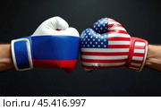 Боксерские перчатки в цветах флагов России и США. Концепция противостояния государств. Стоковое AI-изображение, AI-художник Илья Старков / Фотобанк Лори