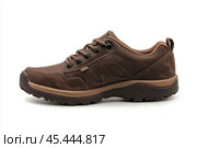 Dark brown leather lace-up running shoes with low tops, thick soles. The laces and black rubber outsole. Sporty look. Men to wear during outdoor activities, hiking. Brown shoes. Trendy Male Boots Pair. Стоковое AI-изображение, AI-художник Марина Демидюк / Фотобанк Лори