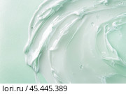 Color correcting concealer stroke. Mint green corrector cream smudge swatch sample. Makeup base foundation creamy texture. Beauty industry, cosmetics. Smooth cosmetic smear of pastel green cream. Стоковое AI-изображение, AI-художник Марина Демидюк / Фотобанк Лори