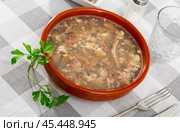Portion of fresh kholodets on dinning table. Стоковое фото, фотограф Яков Филимонов / Фотобанк Лори