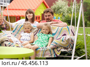 Portrait of a young family with two children. Стоковое фото, фотограф Андрей Аркуша / Фотобанк Лори