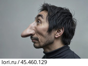 Dark-haired man with a very big nose. Стоковое AI-изображение, AI-художник Дмитрий Киселёв / Фотобанк Лори