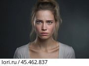 Portrait of a crying caucasian girl with bruised skin on grey studio background. Domestic violence, portrait of abused and hurt young woman crying at home. Sadness and depression concept. Стоковое AI-изображение, AI-художник Sergey Grishin / Фотобанк Лори