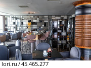 Casablanca, Morocco - April 18, 2024: Interior of a fashionable modern restaurant. Редакционное фото, фотограф Евгений Ткачёв / Фотобанк Лори