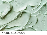 Green cream texture background. Body lotion swipe swatch. Skincare mask. Cosmetic face serum smudge. Moisturizer smooth smear. Trendy bio selfcare beauty product. Peptides, ceramide, retinol. Eco Clay. Стоковое AI-изображение, AI-художник Евгений Демидюк / Фотобанк Лори