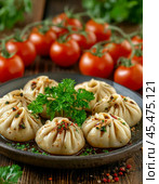 Khinkali with a spicy eggplant filling. Enjoy your meal! Стоковое AI-изображение, AI-художник Сергей Елизарьев / Фотобанк Лори