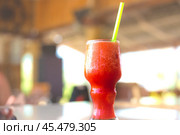 A misted glass with a watermelon smoothie is on the table. A delicious refreshing drink. Стоковое фото, фотограф Коханова Наталья / Фотобанк Лори