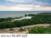 View of Swan Lake from observation deck on Olenya Buda dunes. Curonian Spit National Park. Russia (2021 год). Редакционное фото, фотограф Elena Odareeva / Фотобанк Лори