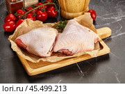 Raw chicken thigh for cooking. Стоковое фото, фотограф Андрей Старостин / Фотобанк Лори