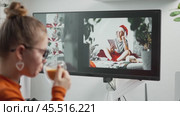 A young female designer drinks coffee and watches neural network generate an image on monitor screen in cozy home office. Neural networks and artificial intelligence help expand human creativity. Стоковое AI-видео, аниматор Енваев Андрей / Фотобанк Лори