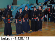 Nizhny Novgorod, Russia, 11.24.2024 Gagarin Avenue 25 d Russian Kendo Championship. Athletes in protective equipment with a sword and a protective helmet at competitions. Редакционное фото, фотограф Egor Sarantstv / Фотобанк Лори