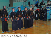 Nizhny Novgorod, Russia, 11.24.2024 Gagarin Avenue 25 d Russian Kendo Championship. Athletes in protective equipment with a sword and a protective helmet at competitions. Редакционное фото, фотограф Egor Sarantstv / Фотобанк Лори