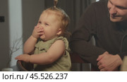 A little girl covers her face and nose with her hand, trying to avoid the unpleasant smell. Стоковое видео, видеограф Strunov David / Фотобанк Лори