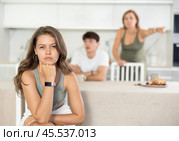 Woman mother and young guy during family quarrel accuse adult daughter. Стоковое фото, фотограф Яков Филимонов / Фотобанк Лори
