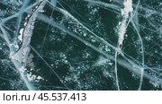 Aerial top view of frozen Lake Baikal. Стоковое видео, видеограф Михаил Коханчиков / Фотобанк Лори