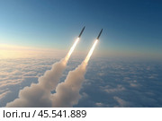 Two rockets flying high above the clouds, leaving contrails. Стоковое AI-изображение, AI-художник Евгений Харитонов / Фотобанк Лори