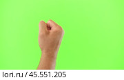 Male Hand Knocking Isolated on Chroma Key Green Screen Background. Body Language. 4K Video Footage. Close-Up. Man's Fist Making Knock Knock Gesture. Copy Space for Promotion. Greenscreen for Keying. Стоковое видео, видеограф Марина Демидюк / Фотобанк Лори