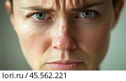 Woman wrinkling her forehead showing anger and disapproval. Стоковое AI-изображение, AI-художник Юрий Поздников / Фотобанк Лори