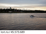 People on a motor boat cross the Volga River near the town of Tutaev. Стоковое фото, фотограф Дмитрий Киселёв / Фотобанк Лори