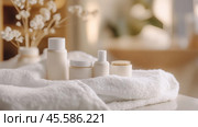 Luxurious skincare and personal care mockup with unbranded bottles and soft textures. Стоковое AI-изображение, AI-художник Sabyna75 / Фотобанк Лори