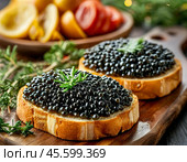 Sandwiches with black caviar. A beautiful and original snack for a festive table. Enjoy your meal! Стоковое AI-изображение, AI-художник Сергей Елизарьев / Фотобанк Лори