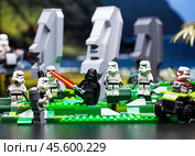 RUSSIA, April 17, 2018. Constructor Lego Star Wars. Squad of stormtroopers and Darth Vader on Easter Island. Редакционное фото, фотограф Андрей Аркуша / Фотобанк Лори